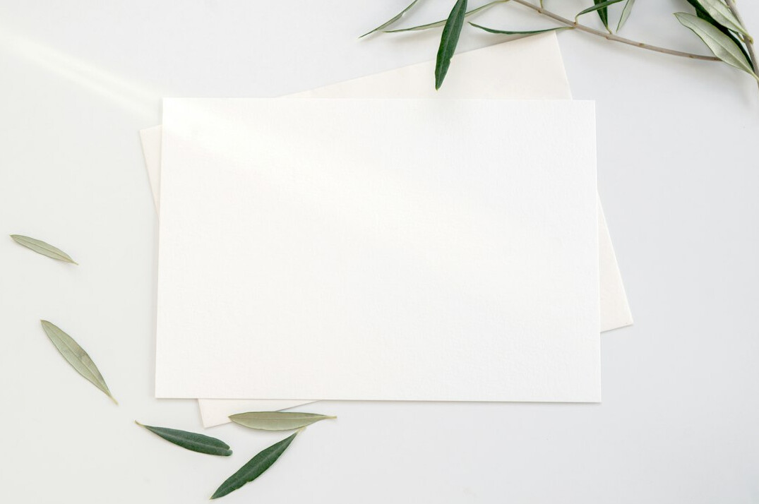 Open notebook with pen on a desk